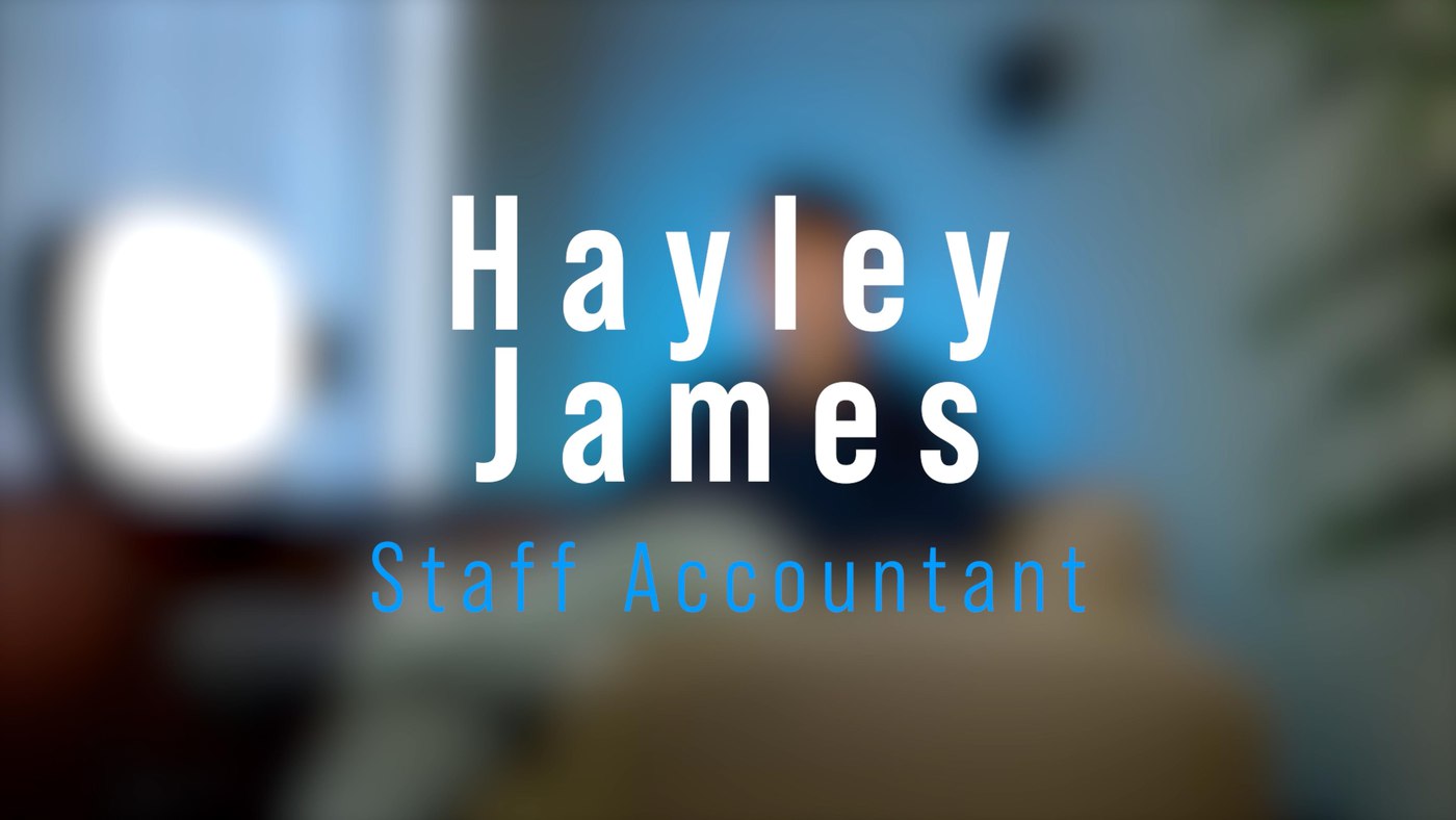Text with employee name and job title over blurred background