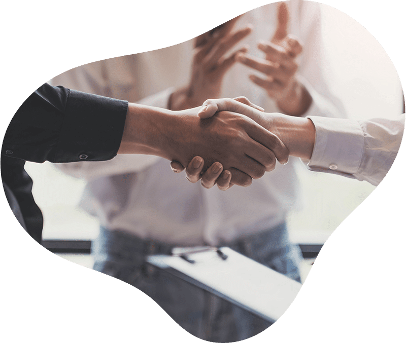 handshake with clapping hands in background